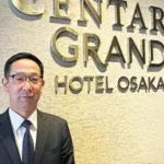 「地上130㍍から大阪の街を見渡せるレストランは、ホテル最大の魅力」と話す中川総支配人